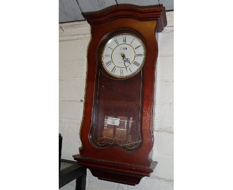 An Acctim Westminster chimes wall clock