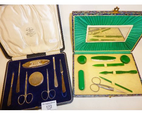 Two vintage manicure sets, one with hallmarked silver handles, the other Art Deco green plastic. Both circa 1920s/30s. Sold o