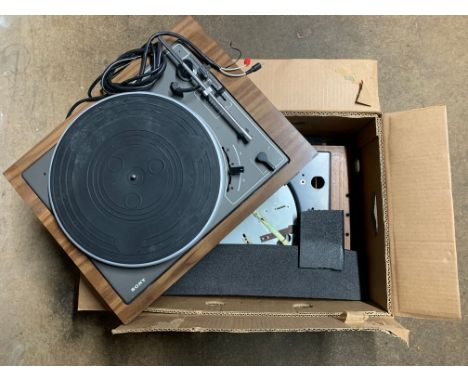 BOX OF SPARE PARTS FOR GOLDRING RECORD PLAYERS. Parts for two Goldring record decks. One includes turntable and playing arm. 