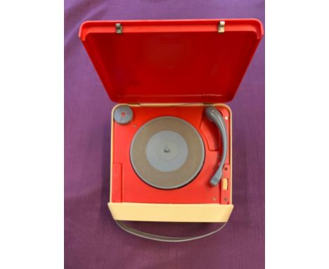 A Children's Record Player. A Triang children's battery-powered miniature record player, circa 1960s (?) Still with original 