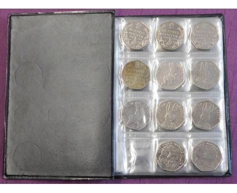 Great Britain Beatrix Potter 50 pence collection in a small album, light duplication, (35) mostly EF-AUNC. Useful lot