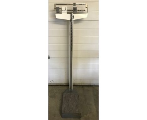 A vintage Detecto stand on weighing scales.  Please Note: All enquiries will be responded to after we re-open in the new year