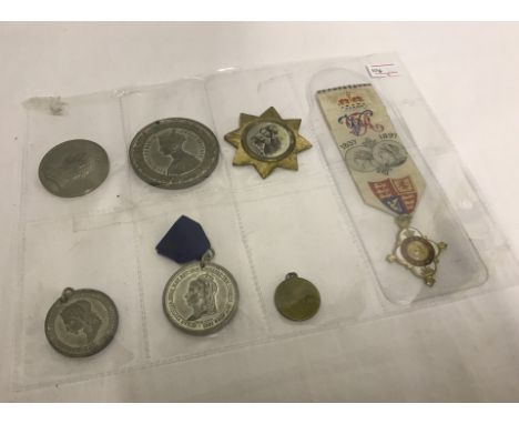 7 Victorian commemorative medals. To include 1 suspended from embroidered sash. Please Note: All enquiries will be responded 