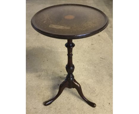 Small vintage wine table with tripod legs. Inlaid detail to centre. Measures 28cm diameter x 52cm tall. Please Note: All enqu