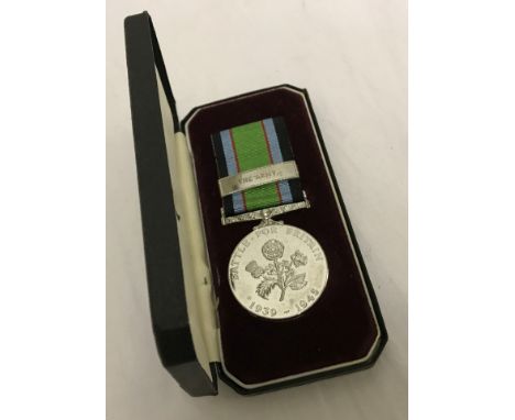 A cased Battle For Britain commemorative medal with the army clasp.  Please Note: All enquiries will be responded to after we