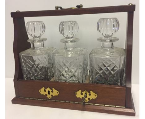 Modern 3 decanter tantalus. With key. Please Note: All enquiries will be responded to after we re-open in the new year on 3/1