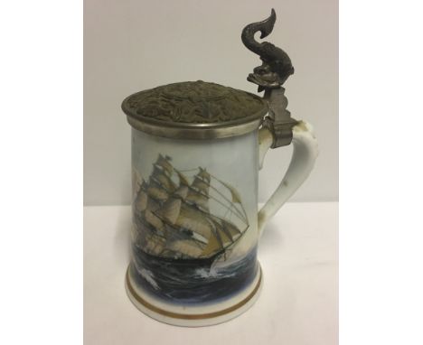 A large ceramic lidded tankard. Depicting 'Greyhounds of the Sea' by Leonard Pearce. Franklin Porcelain by Haviland Limoges. 