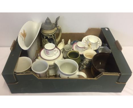A box of assorted ceramics. To include Copeland Spode, Portmerion and Poole. Please Note: All enquiries will be responded to 