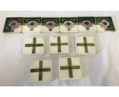 11 Art Nouveau  ceramic French tiles of poppy and crazed cross design.  Each tile 8.5 cm square. Please Note: All enquiries w