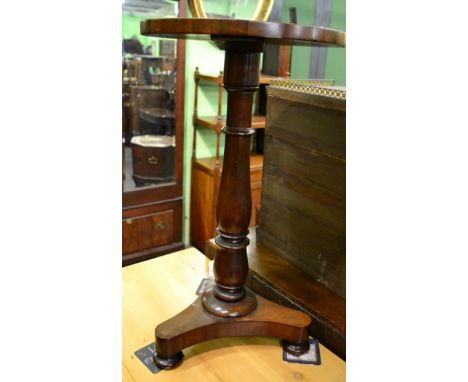 A mid 19th century mahogany tripod table 