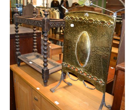 An oak bobbin umbrella stand and an Arts & Crafts fire screen 