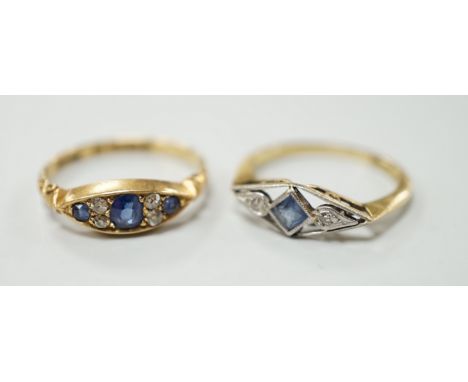 Two early 20th century 18ct, sapphire and diamond set rings, including Edwardian seven stone, size L and K/L, gross weight 4.