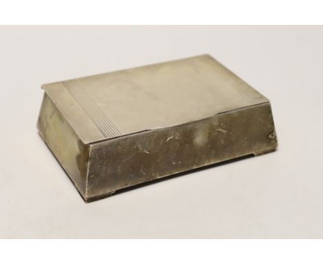 A George VI engine turned silver mounted cigarette box, of tapering rectangular form, the lid interior wit engraved inscripti