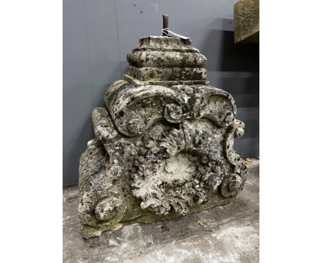 A carved stone corbel, width 60cm, height 60cm