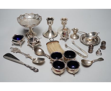 Sundry small silver including four salts by Mappin &amp; Webb, three mounted dwarf candlesticks, two white metal Egyptian dis