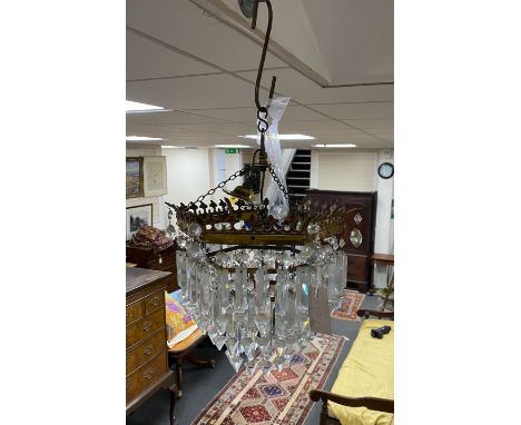 A three tier ceiling light with prismatic cut drops height 27cm.
