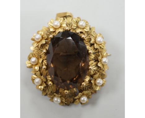 A yellow metal, oval cut brown quartz and cultured pearl set pendant brooch, 34mm, gross weight 12.8 grams.