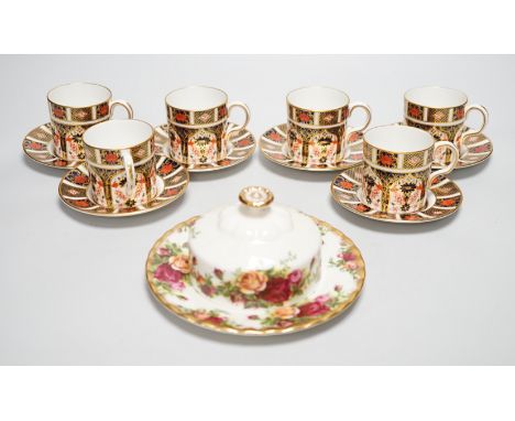 Six Royal Crown Derby coffee cans and saucers and a Royal Albert Country Roses dish and cover