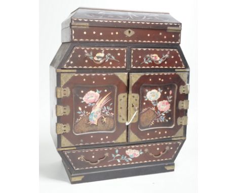 A Japanese inlaid mother-of-pearl miniature chest. 36cm tall