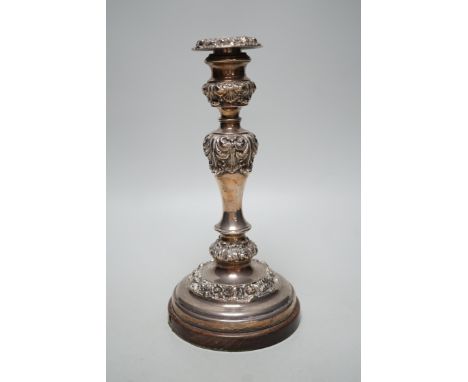 A George IV silver candlestick, Thomas Blagden &amp; Co, Sheffield, 1822, now mounted on a later wooden base, with drill hole