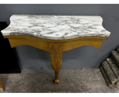 A Victorian style carved giltwood marble topped serpentine console table, width 84cm, depth 44cm, height 79cm