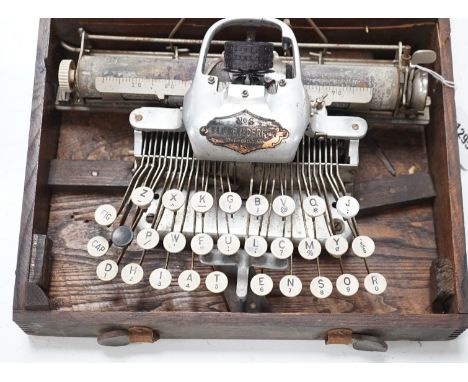 A Blickensderfer typewriter in fitted wooden case
