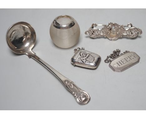 A small Edwardian silver mounted ribbed glass match tidy, height 40mm, a Georgian Scottish Kings pattern sauce ladle, a silve