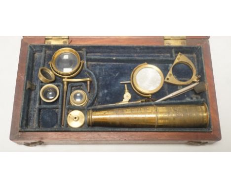 A 19th century monocular microscope, in mahogany case