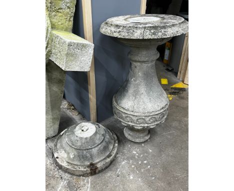 A reconstituted stone baluster sundial base, diameter 49cm, height 107cm (a.f.)