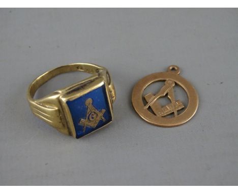 A TEN CARAT GOLD MASONIC RING and a nine carat gold circular pendant, 5.6 and 2.6 grms respectively, the ring set with blue g