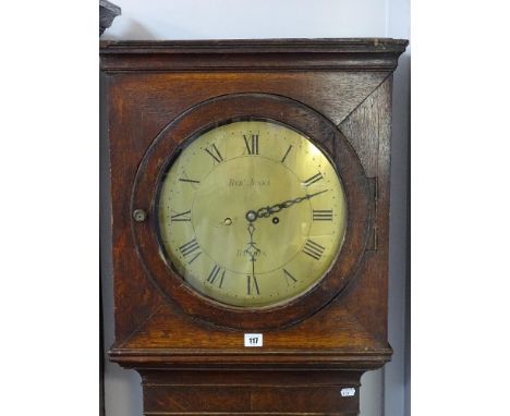 AN ANTIQUE OAK CIRCULAR BRASS DIAL LONGCASE CLOCK by Robert Jones, Ruthin, twin weight pendulum driven movement striking on a