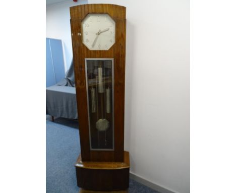 A FRENCH ART DECO WALNUT &amp; CHROME LONGCASE CLOCK with triple weight chiming pendulum driven movement, 200 cms high, 63 cm
