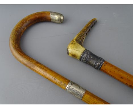 A MALACCA RIDING CROP and a silver mounted walking stick, 73 cms and 91 cms long respectively