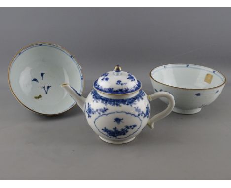 TWO NANKING CARGO BLUE &amp; WHITE DECORATED CERAMIC BOWLS and a bullet shaped teapot, similar period Chinese porcelain, the 