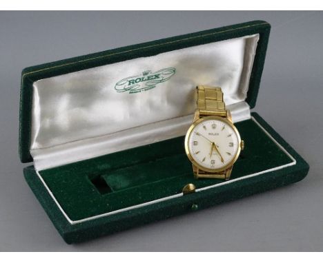 A ROLEX PRECISION NINE CARAT GOLD CASED GENT'S WRISTWATCH with expanding rolled gold bracelet strap, the dial marked 'Rolex P