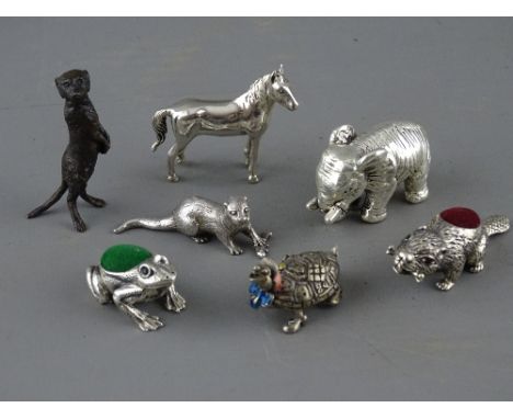 SIX SILVER ANIMAL FIGURINES &amp; ONE OTHER including an otter, London 1980, 19.9 grms, a standing horse stamped 925, 15.8 gr