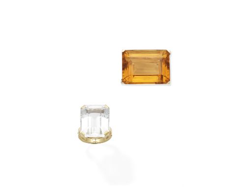 A topaz ring and a citrine clip, mid 20th century1st: Set with a step-cut colourless topaz to an expandable band, 2nd: Set wi