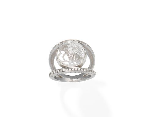 A diamond 'Stars of Africa' dress ring, by Royal AsscherDesigned as a colourless sapphire 'snow-globe' with 'floating' brilli