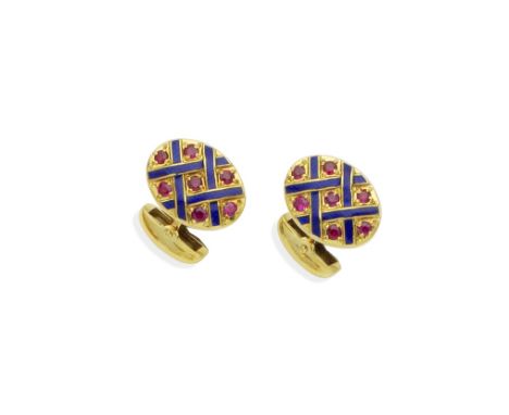 A pair of ruby and enamel cufflinks, by Deakin and Francis, 1995Single-sided: Each oval-shaped plaque of blue guilloché ename