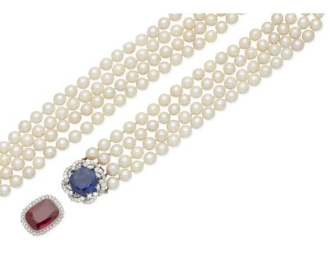 A cultured pearl necklace with a sapphire and diamond claspThe clasp set with a circular-cut sapphire, weighing 23.77 carats,