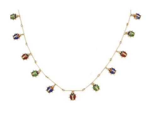 An enamel necklaceThe polished batons set to the front with a series of double-sided polychrome enamel ladybird charms, some 