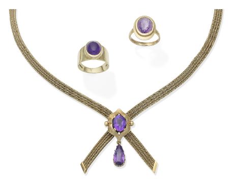 An amethyst necklace, 1962, an amethyst ring, 1968, and an amethyst ring1st: The oval-cut amethyst within a polished openwork