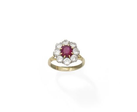 A ruby and diamond cluster ringThe cushion-shaped ruby within a surround of brilliant-cut diamonds, diamonds approx. 1.60cts 