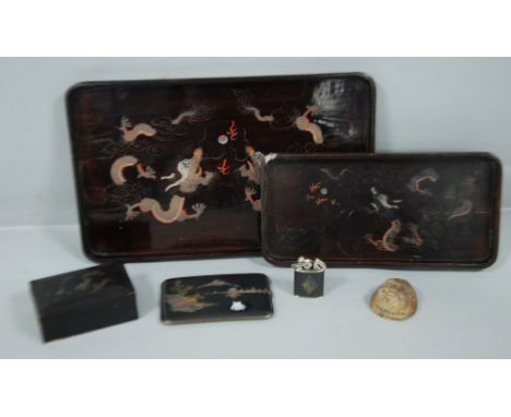 TWO JAPANESE LACQUER ROUNDED OBLONG TRAYS, A SMALL LIDDED BOX, a Japanese lacquered metal CIGARETTE CASE, a CIGARETTE LIGHTER
