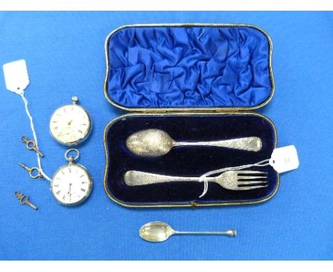 A cased Edwardian silver Spoon and Fork Set, by William Hutton & Sons, hallmarked London, 1904, with bright cut floral and fo