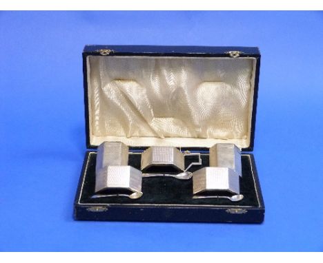 An attractive George VI five piece cased silver Cruet Set, by A.C.Bloxham Ltd., hallmarked Birmingham, 1937, in an Art Deco s