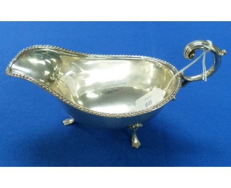 A George V silver Sauce Boat, by William Hutton & Sons Ltd., hallmarked Sheffield 1918, of traditional form with gadrooned ri