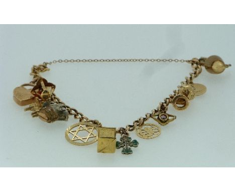 A 9ct Charm Bracelet, the suspended with twelve charms, 7 marked 9ct, including wishing well, teapot, etc., with a 9ct yellow