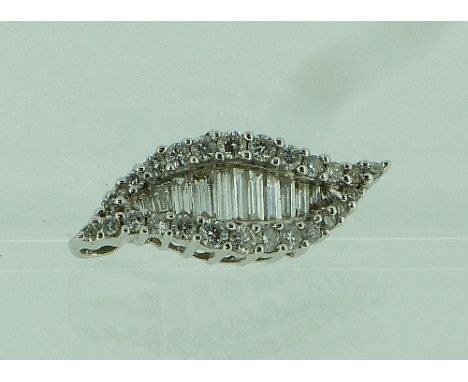 A diamond and white gold Pendant, of shaped marquise form, the centre set with nine baguette cut diamonds set horizontally wi