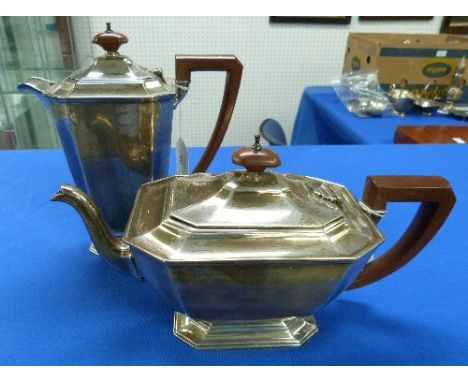 A George V silver Teapot, by Adie Brothers Ltd., hallmarked Birmingham, 1933, of plain octagonal form, on corresponding base,